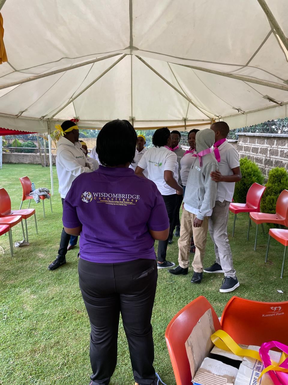 Trust-building team activity under a tent